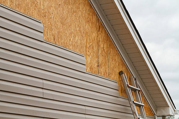 Professional Vinyl Siding technician working in Lansdale, PA